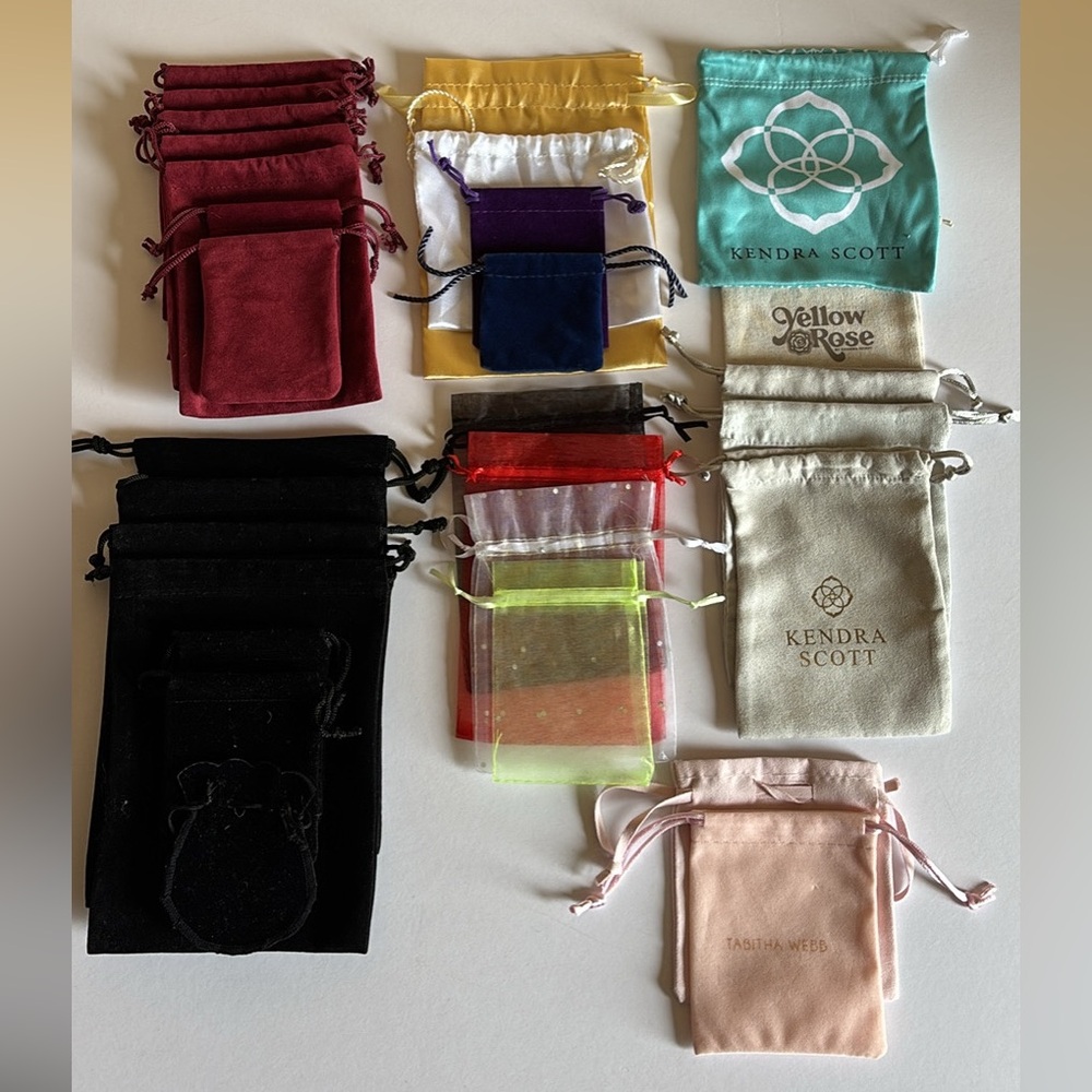 29 jewelry pouches including 5 Kendra Scott, 1 Tabitha Webb